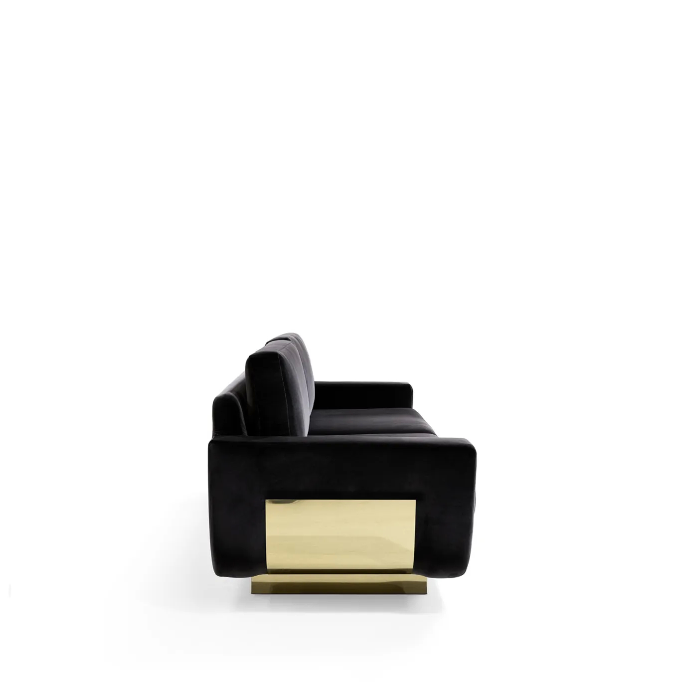 A side view of the luxurious Sofia Sofa by Koket, upholstered in rich black velvet, with a striking gold base.
