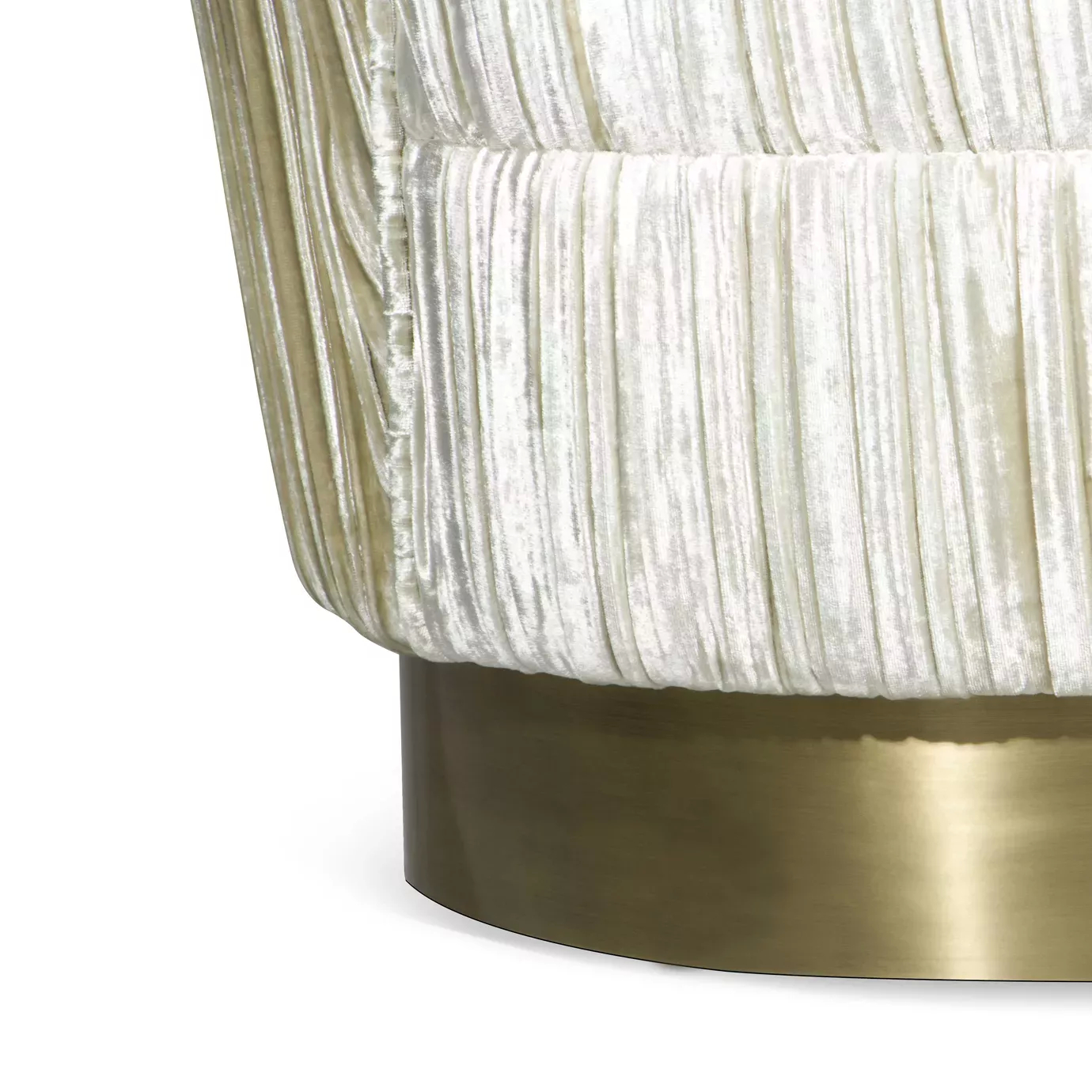 Elegant close-up of the golden metal base and the textured beige fabric upholstery with pleated details of the Kelly Loveseat.
