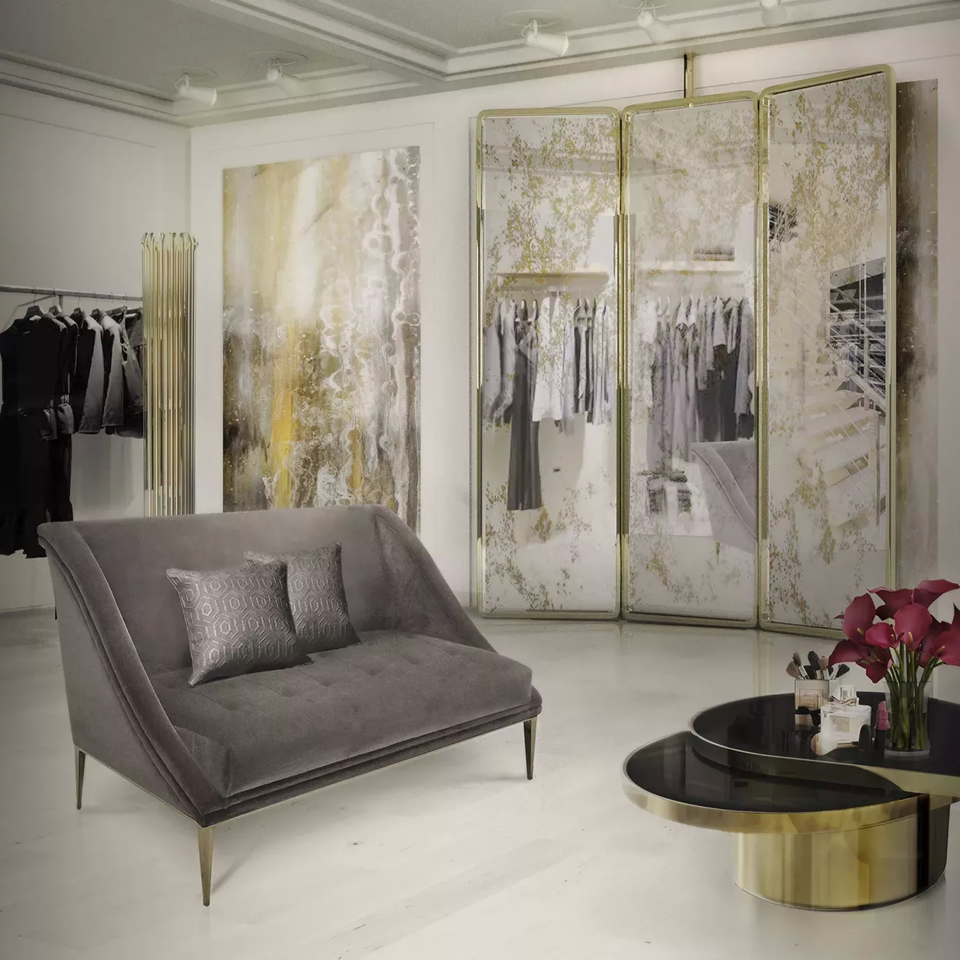 Elegant commercial space featuring the Geisha Sofa in grey velvet with patterned cushions, a Tears Coffee Table, and sophisticated clothing displays.