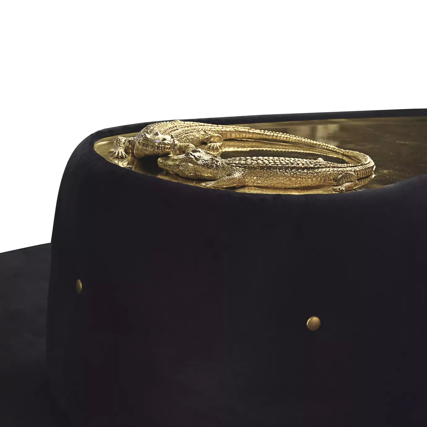 Elegant close-up of the golden metal detail with crocodile sculptures of the Reptilia Sofa with black velvet upholstery.