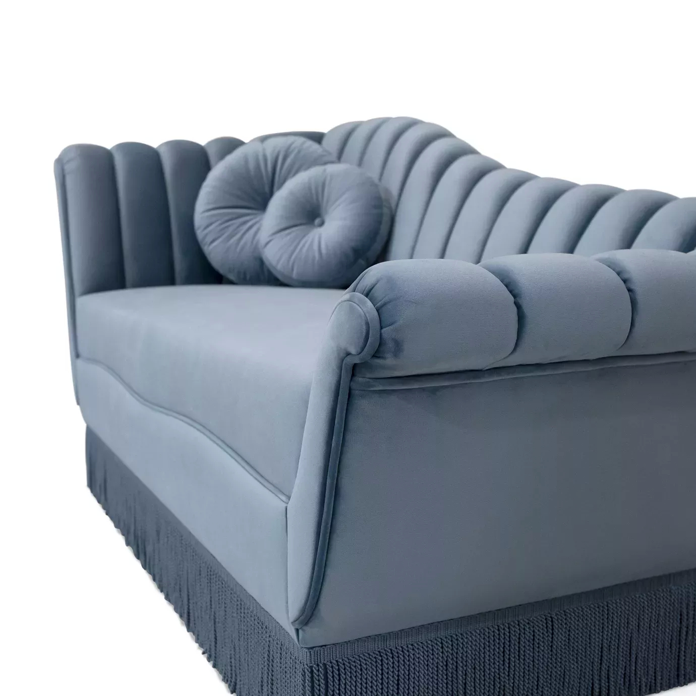 Elegant Millicent Chaise with blue velvet upholstery, pleated details, and round pillows.