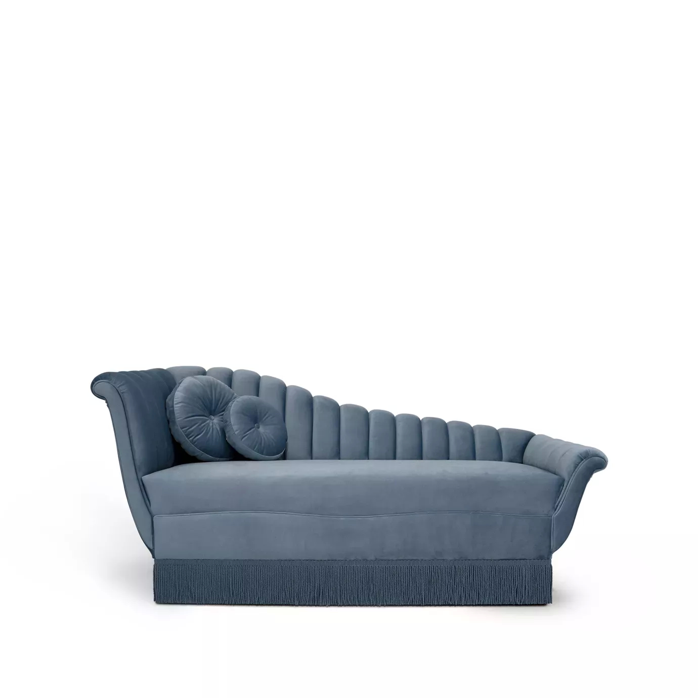 Elegant Millicent Chaise with blue velvet upholstery, pleated details, and round pillows.