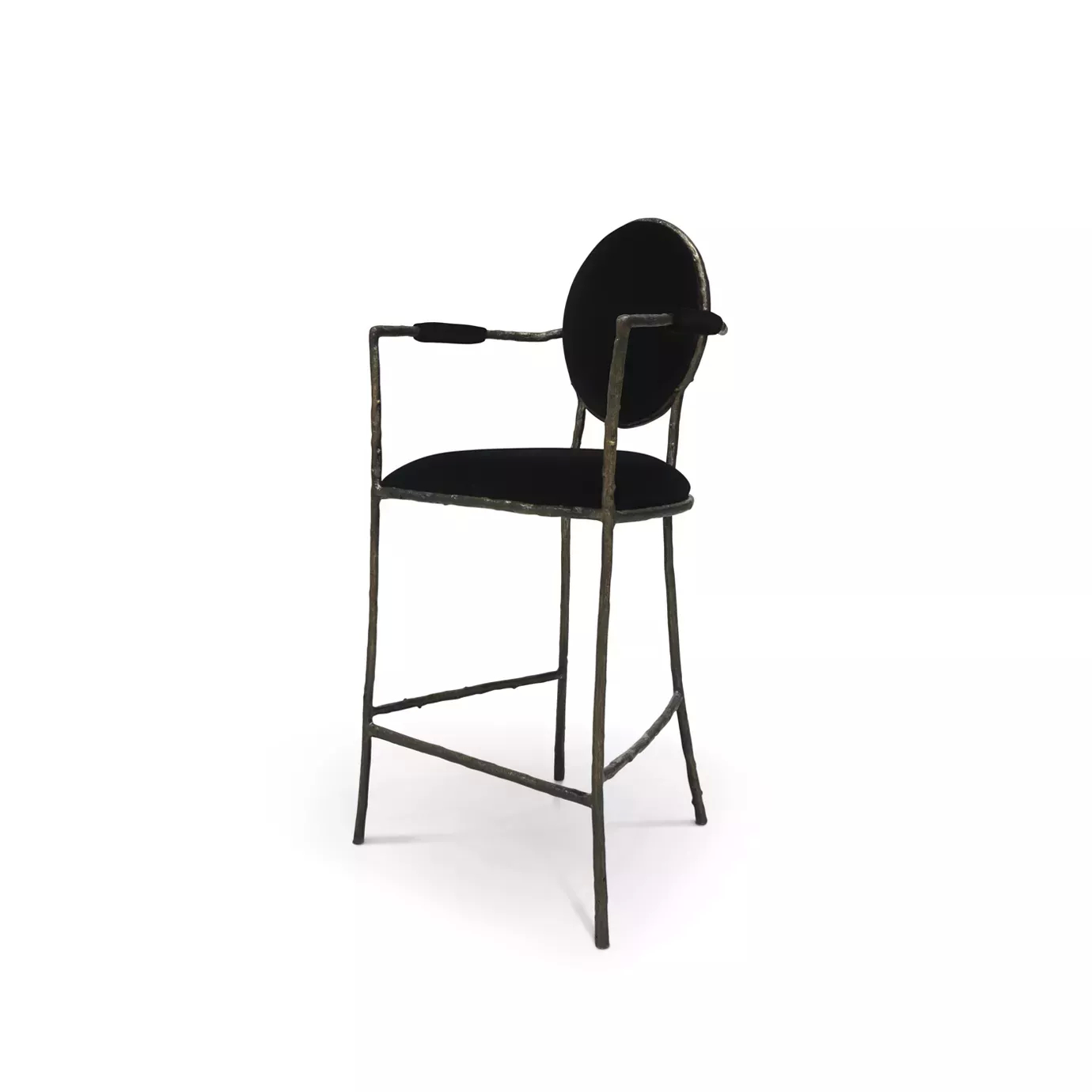 Showcasing its elegant aged brass frame that resembles branches, the Enchanted Bar Stool features a glamourous black upholstery.