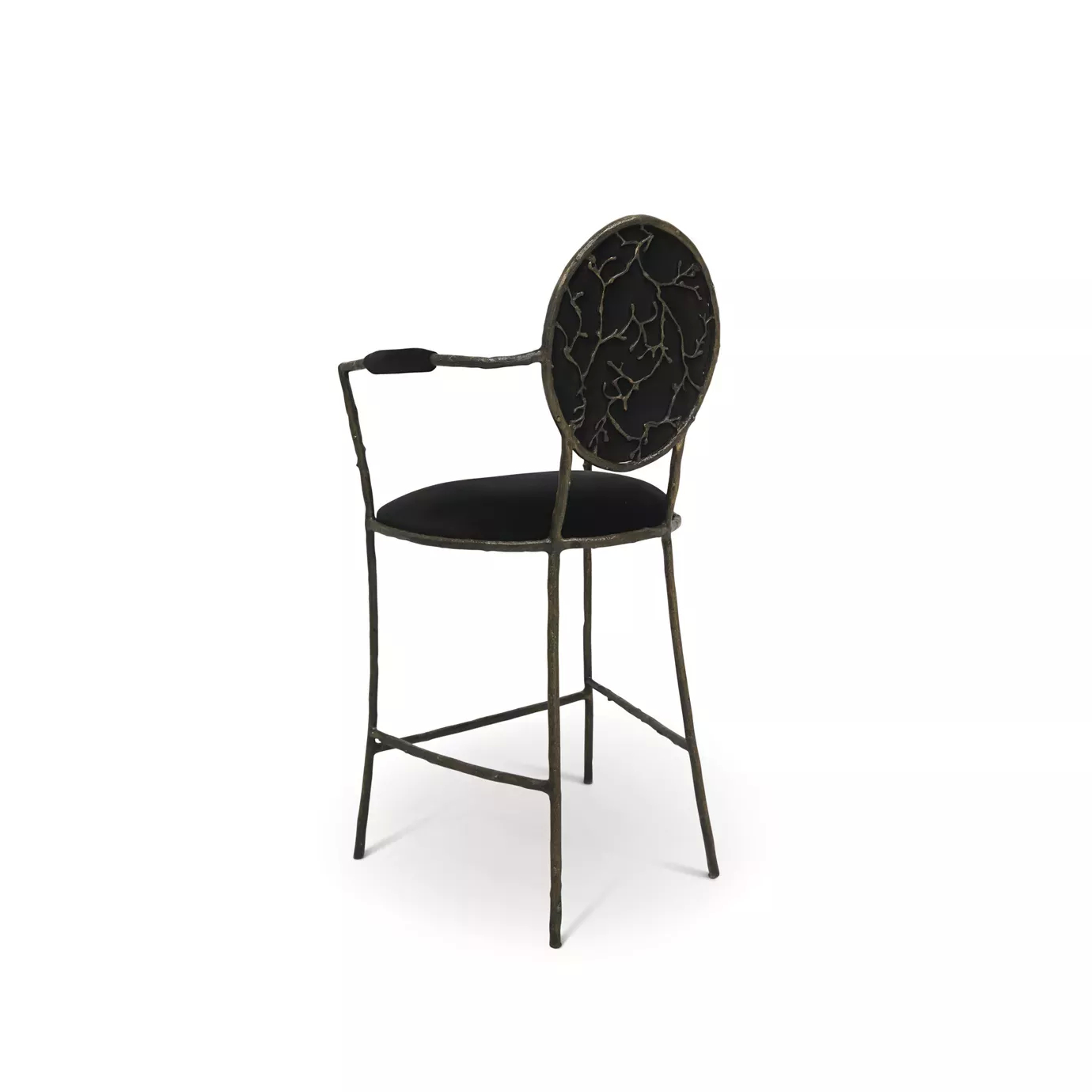 Enchanted Bar Stool: Showcasing its elegant aged brass frame that resembles branches, the dining chair also features a glamourous black upholstery.