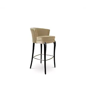 Elegant Délice Bar Stool with beige velvet upholstery and glossy black legs with golden detail.