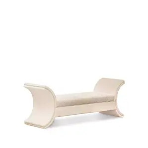 Elegant Luna Bench with curved design and light textured fabric upholstery.