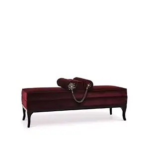 Elegant Lé Lé Bench with burgundy velvet upholstery, dark frame, and decorative cylindrical pillows with golden details and chains.
