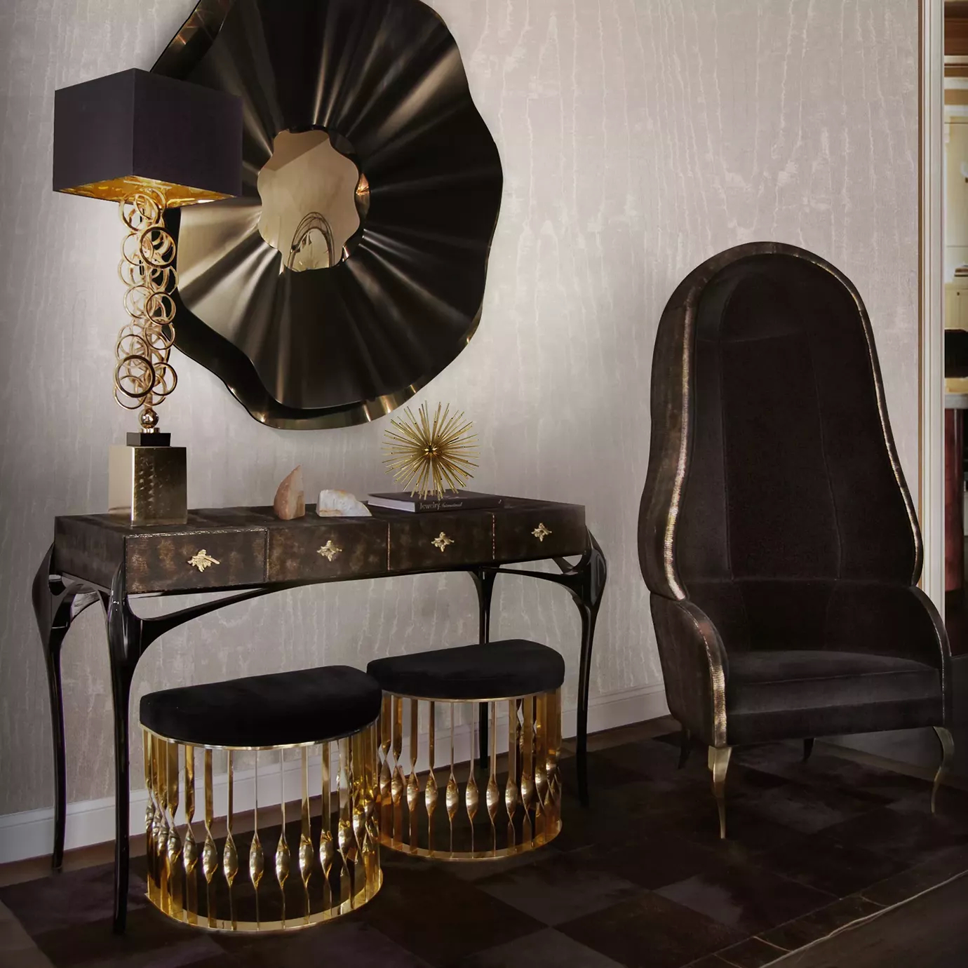 Elegant dressing corner with two Mandy Stools featuring black velvet seats and sculptural golden bases under a dark console with golden details and a sculptural mirror.