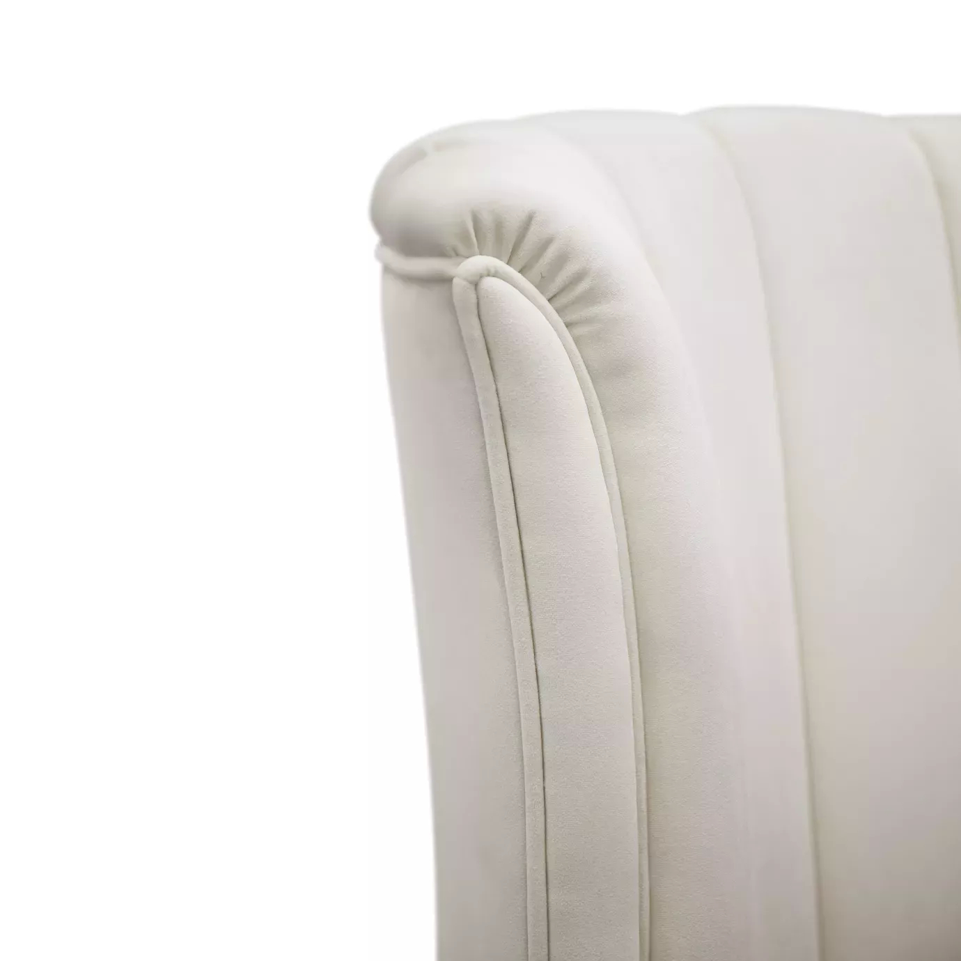 legant close-up of the light textured fabric upholstery detail with vertical button-tufting of the Sevilliana Bed's headboard.