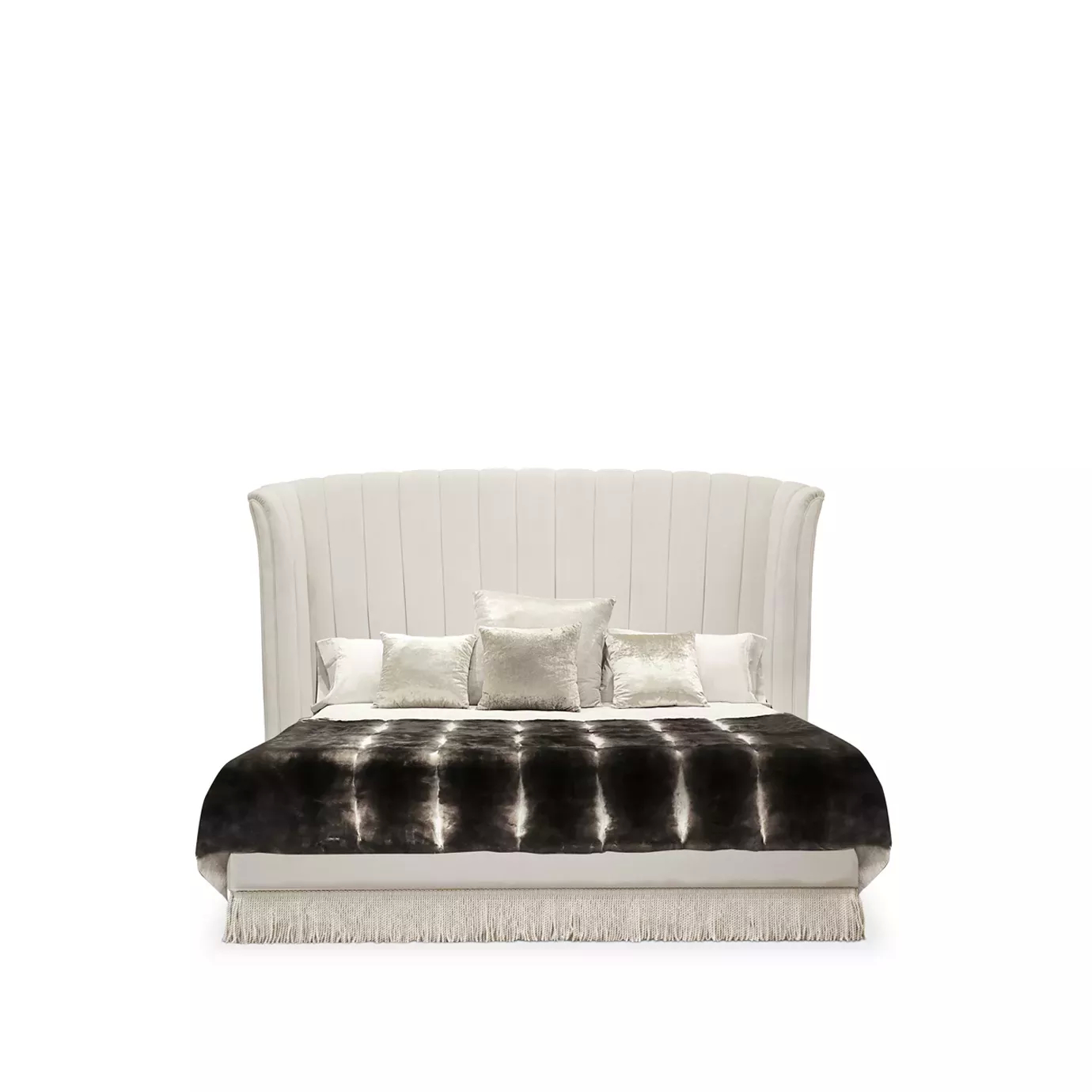 Elegant Sevilliana Bed with high headboard and light textured fabric upholstery with vertical button-tufted details, light bedding, and a dark fur throw with fringes.