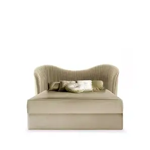 Elegant Kelly Bed with high headboard and curved design featuring light-toned textured fabric upholstery and matching bedding with decorative pillows.