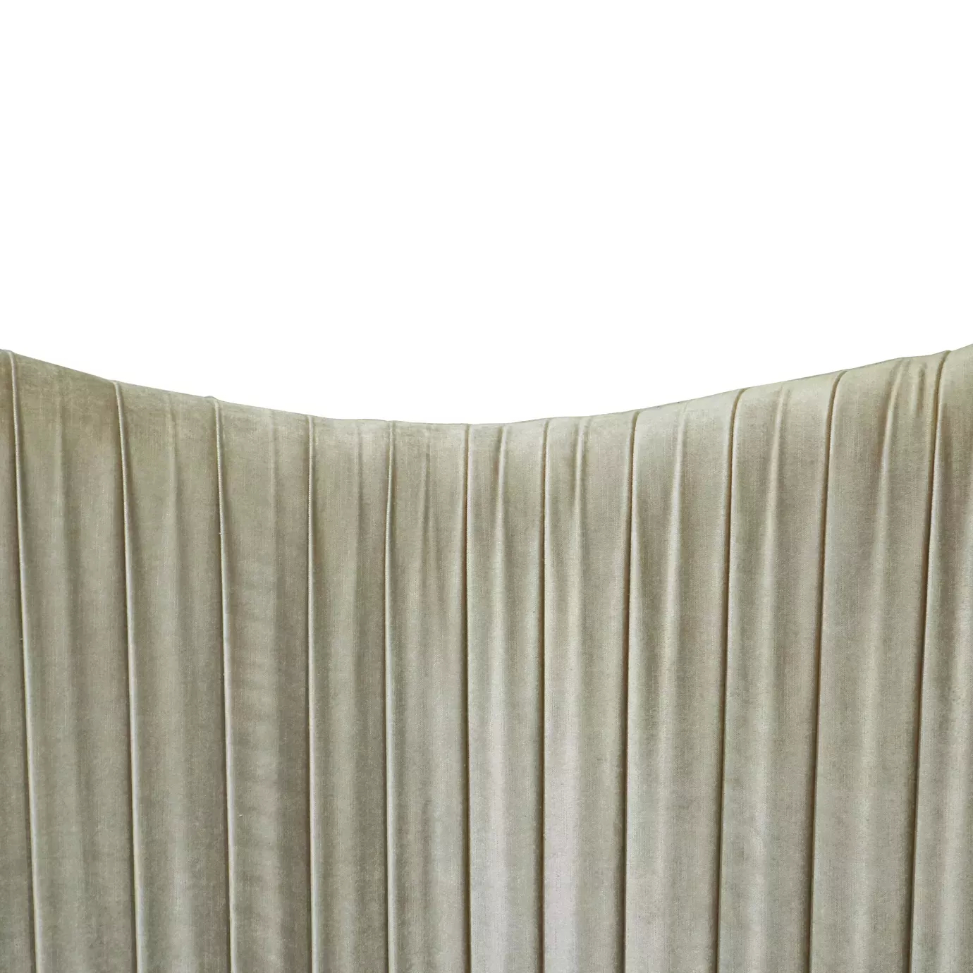 Elegant close-up of the light-toned textured fabric upholstery detail with a vertical design on the curved headboard of the Kelly Bed.