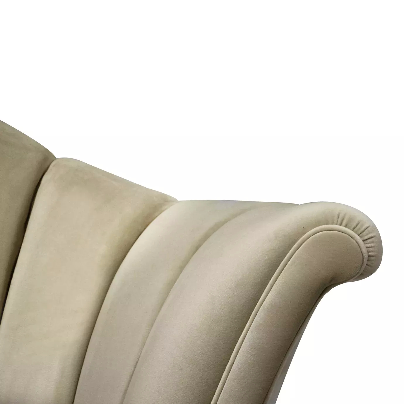 A close-up shows the soft, light beige velvet upholstery and vertical channel tufting detail of the Caprichosa Bed's scalloped headboard.