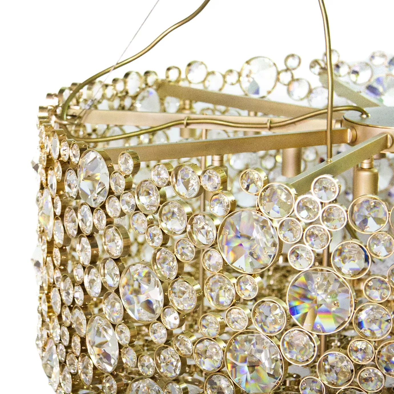 Elegant close-up of the golden frame detail studded with various sparkling crystals of the Eternity Chandelier.