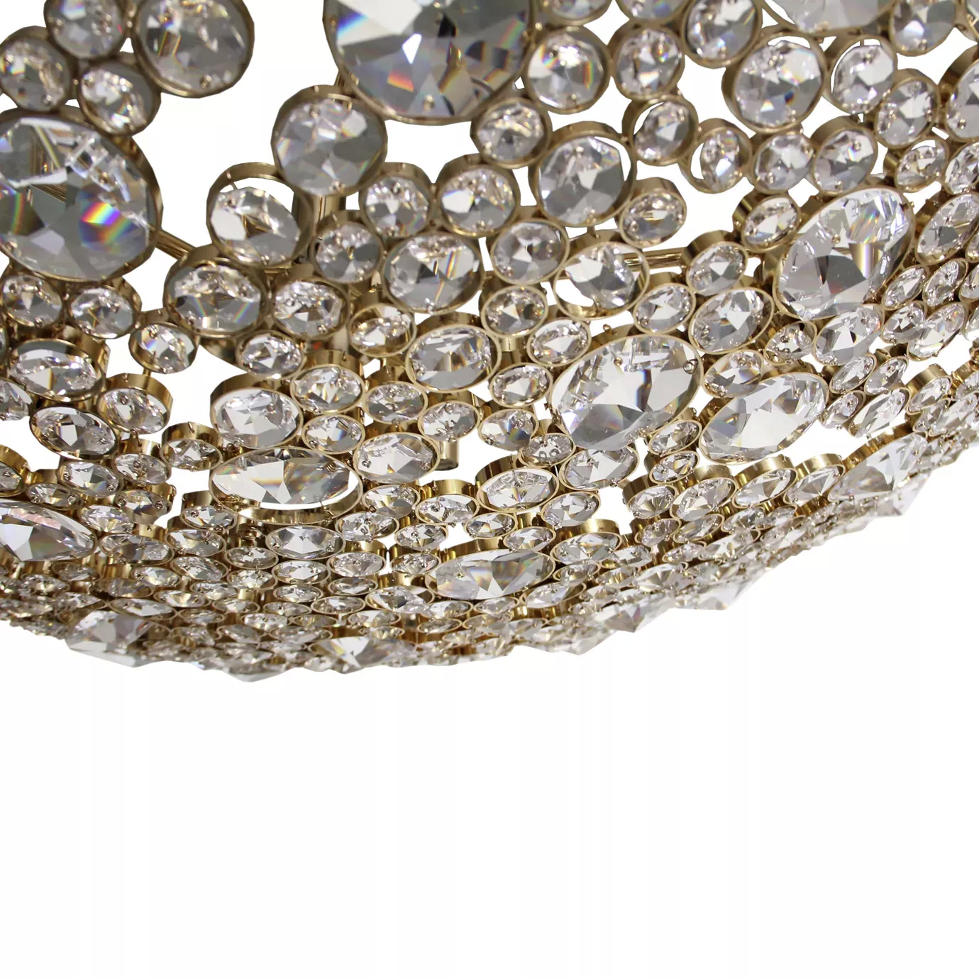 Elegant close-up of the golden half-moon shaped frame detail studded with numerous sparkling crystals of different sizes of the Eternity Demi Lune Chandelier.