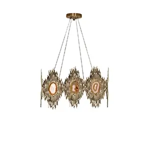 Elegant Vivre Square Chandelier with a sculptural design in golden tones and translucent agate details.