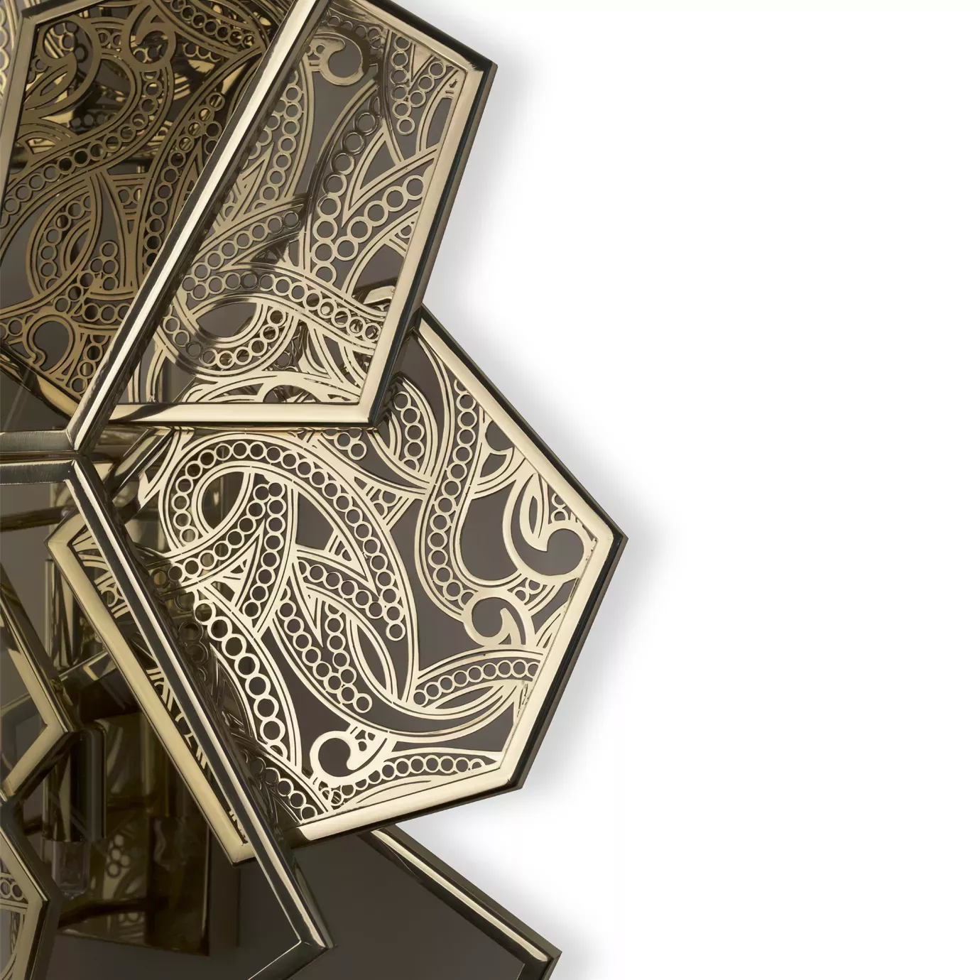 Elegant close-up of the geometric pieces detail in golden tones with intricate patterns and bronze glass details of the Hypnotic Sconce.