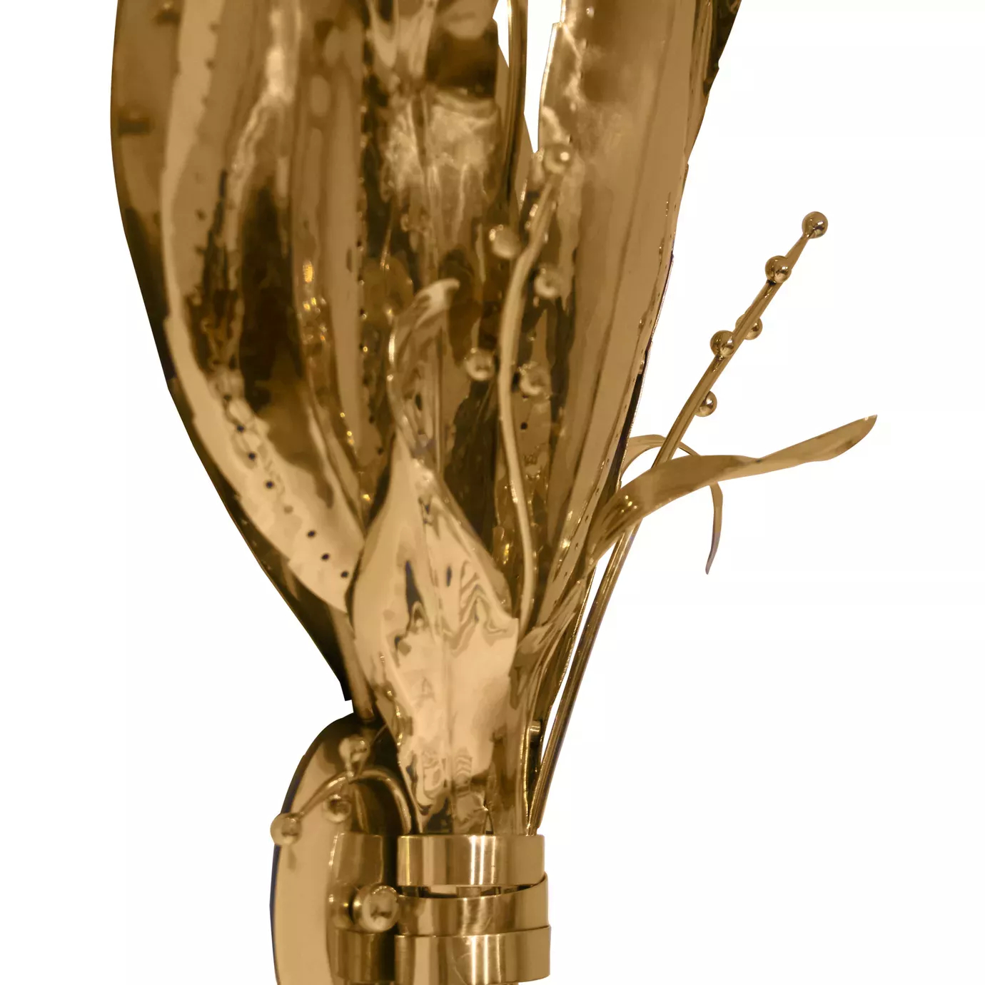 Elegant close-up of the curved leaf details and the stems with small spherical accents of the Botanica Sconce.