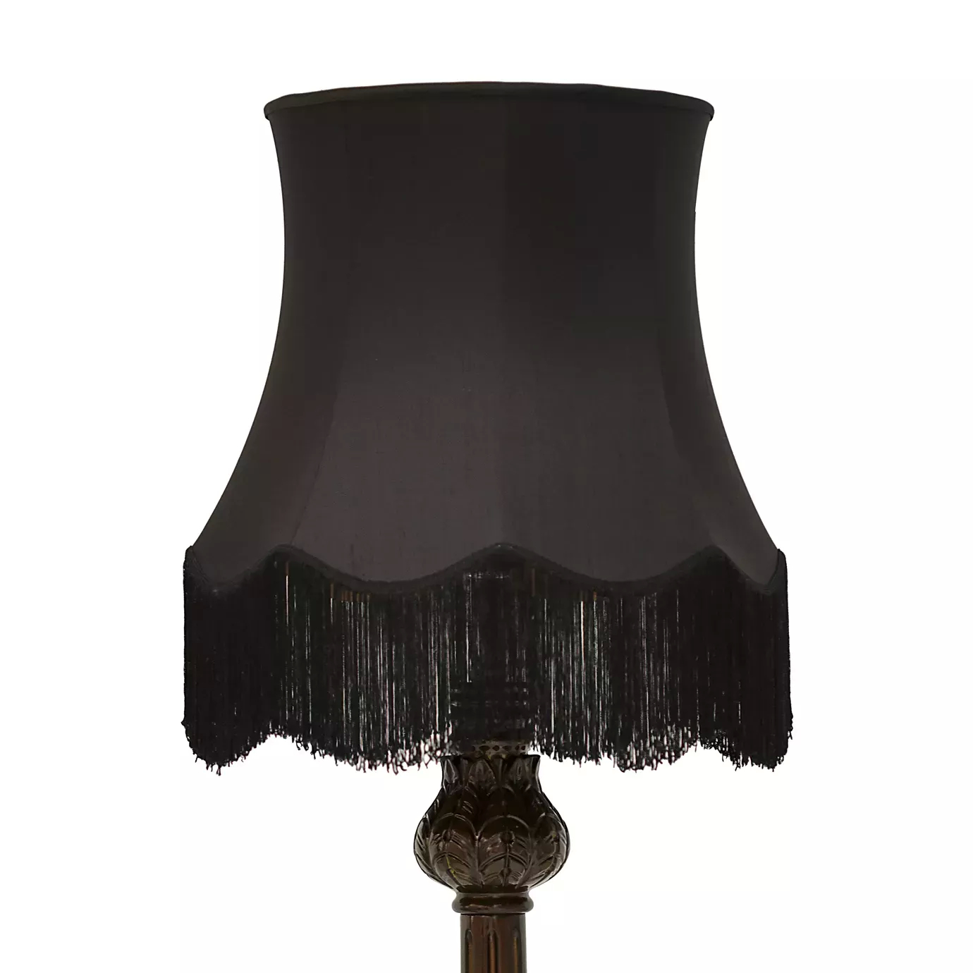 Elegant close-up of the black lampshade detail with a wavy edge and fringes of the Lotus Floor Lamp.