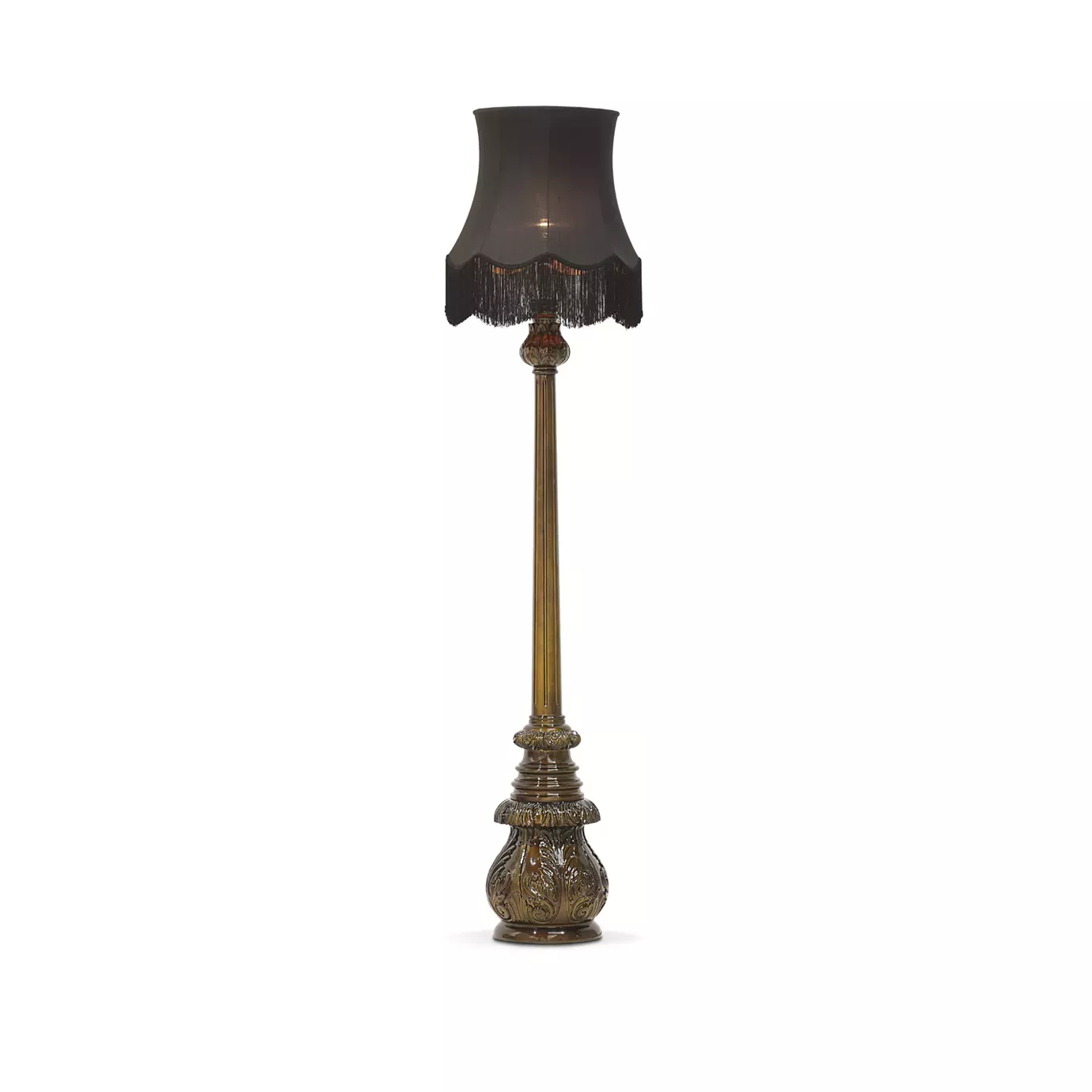 Elegant Lotus Floor Lamp with an ornate sculpted base in brown tones, a decorative vertical stem, and an illuminated black lampshade with fringe details.