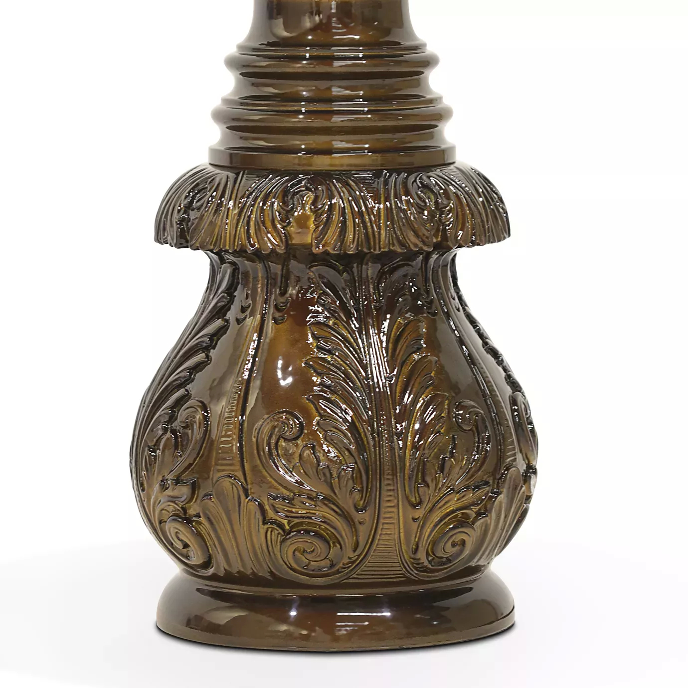 Elegant close-up of the ornate sculpted base detail in brown tones of the Lotus Floor Lamp.