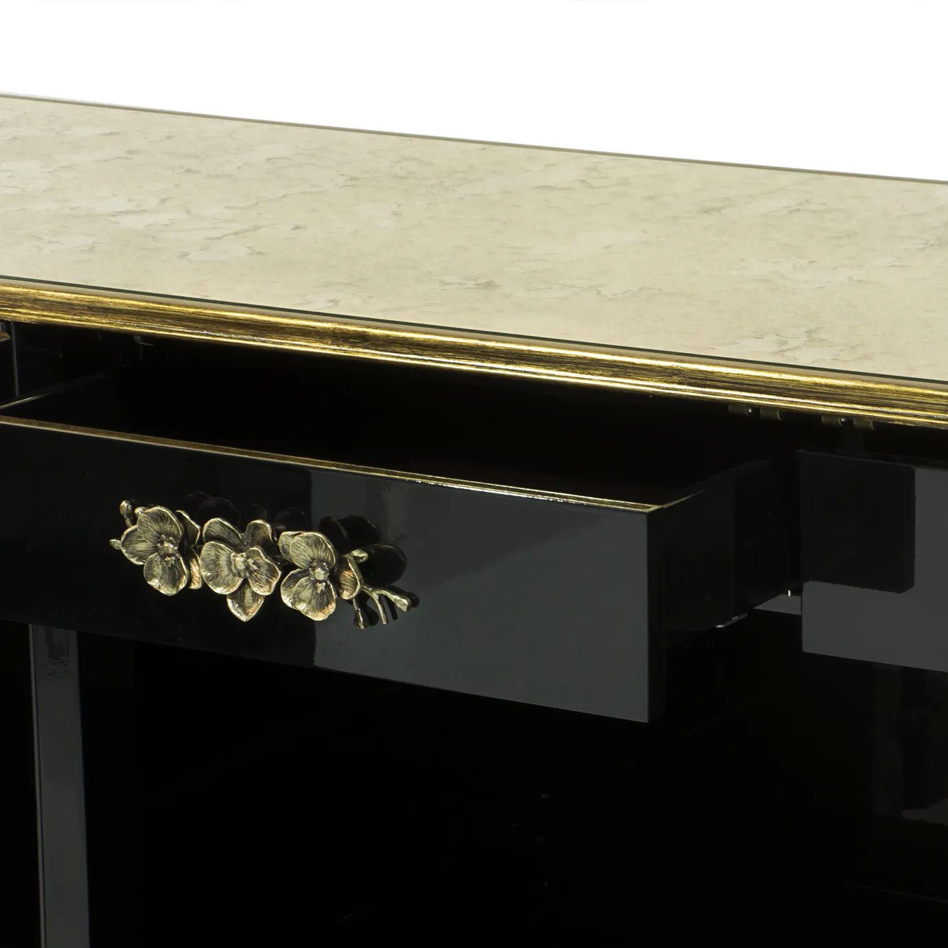 Interior view of the Spellbound Purple Feather Cabinet, showing its black drawers with metal lace handles in floral motifs.