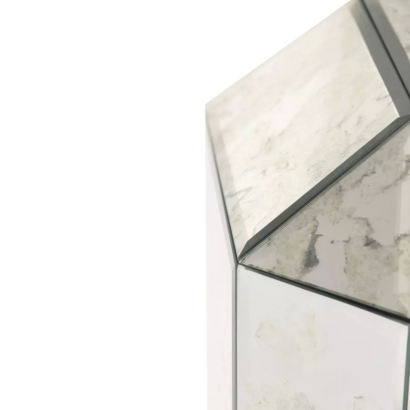 Elegant close-up of the mirrored geometric design of the Tamara Console.