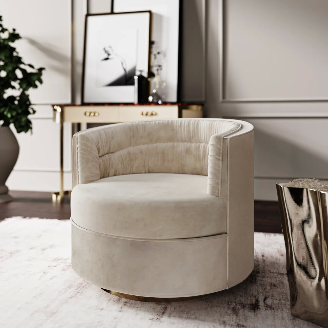 Elegant corner with the Cocktail Armchair upholstered in soft beige fabric with ruched details on the inner backrest and a golden metal base, on a light patterned rug, next to a textured golden side table and in front of a white and gold console table with a black and white framed photograph and decorative objects.