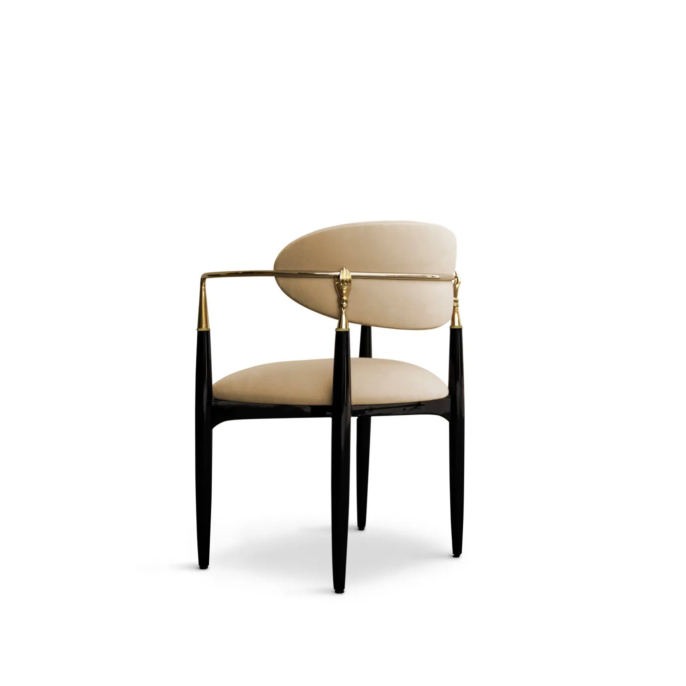 Side view of the Nahéma Chair, showcasing the black structure, creamy upholstery and the golden hand-shaped detail on the backrest.