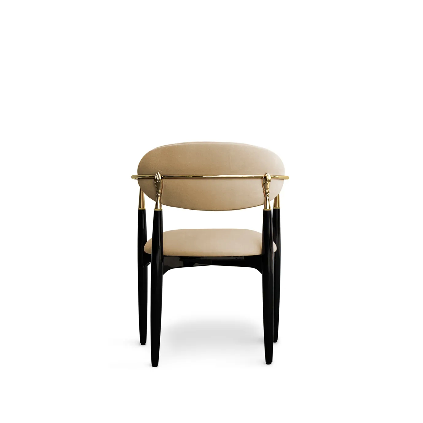 Nahéma Chair seen from behind, showcasing its black frame and golden accents, with a focus on the hand-shaped details on the backrest of the chair, complemented by an elegant cream velvet uphostery.