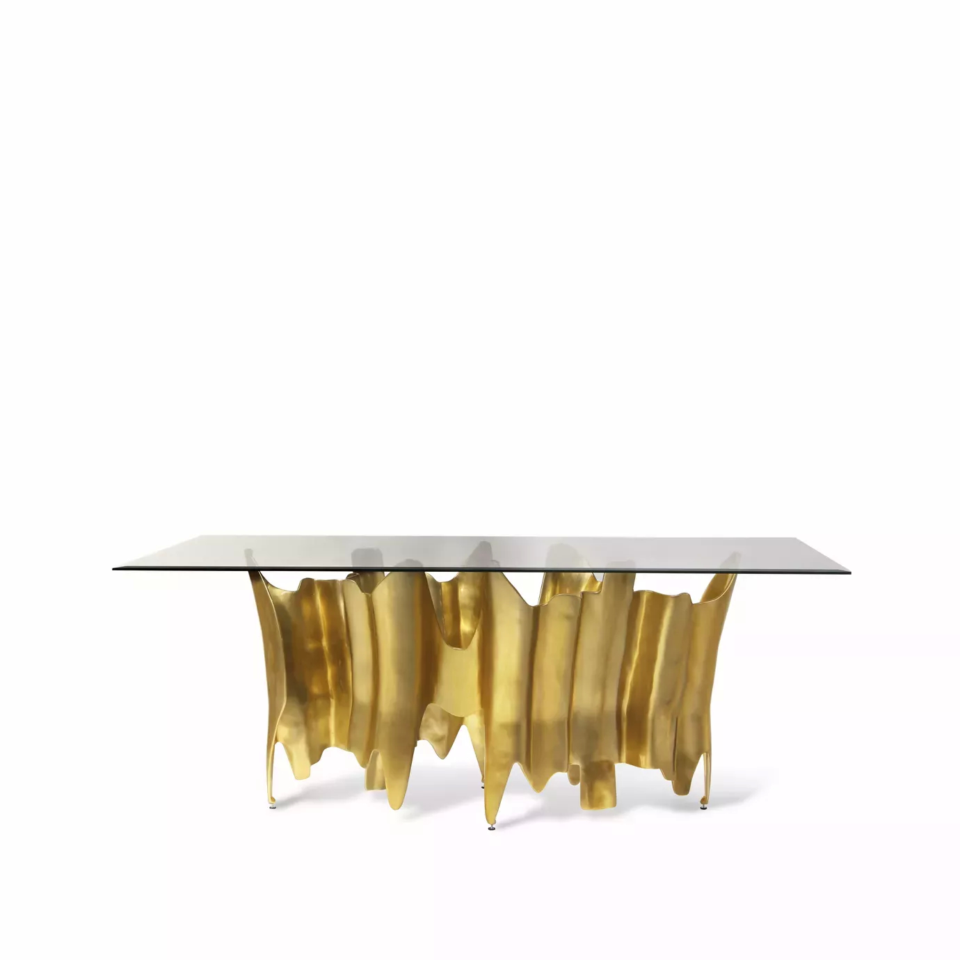 Elegant Obssedia Dining Table with glass top and sculptural golden base.