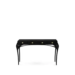 Elegant Temptation Console with a long black tabletop featuring four drawers adorned with decorative golden star-shaped handles, and a frame with curved black legs and a sculptural golden detail at the base.