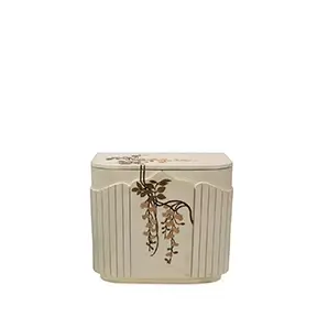 Elegant Fleur Nightstand with a curved design and cream-white finish adorned with a delicate floral pattern in shades of brown and gold on the sides and top.