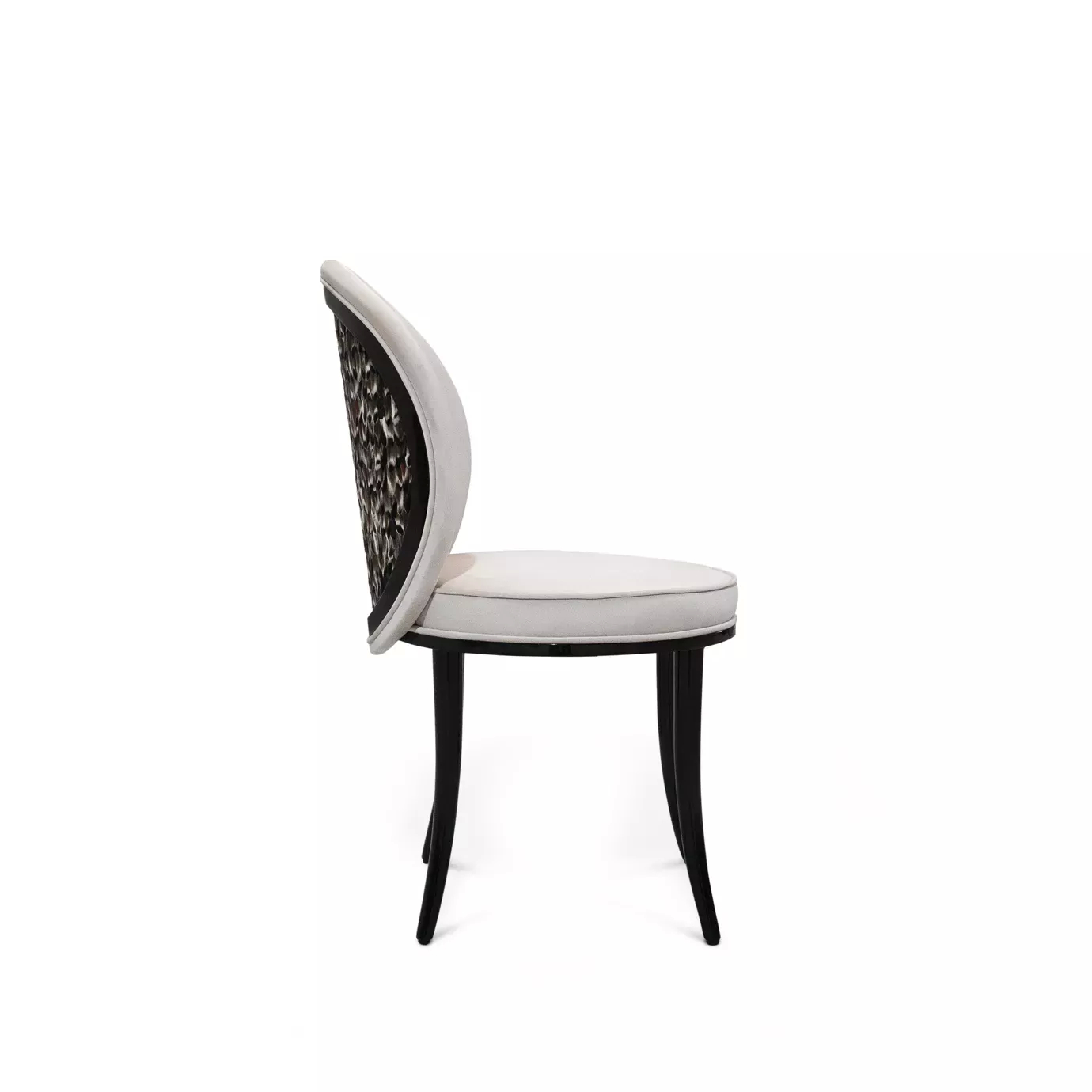 Elegant Merveille Folie Dining Chair with a curved backrest adorned with a feather pattern in shades of brown and black, white upholstery on the seat and backrest edges, and tapered black legs, viewed from the side.