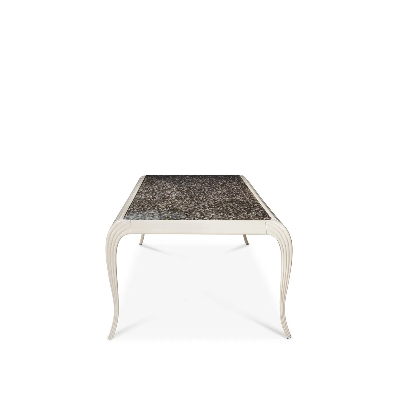 Elegant Merveille Dining Table with a rectangular top adorned with an exotic feather pattern in shades of brown, black, and white, and a curved white base with vertical textured details, viewed from an angle.