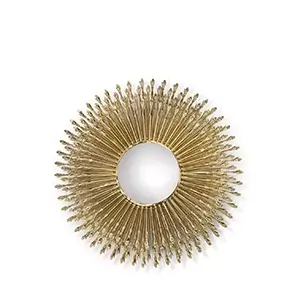 Goddess Mirror in a circular form with a golden frame portraying multiple tiny hands around the mirror.