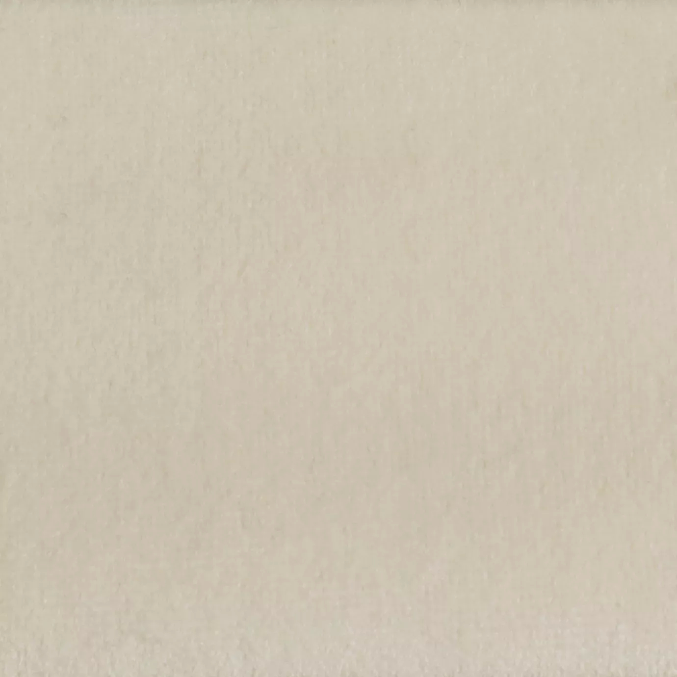 Elegant close-up of a Paris Velvet fabric swatch in a soft and light beige tone, showcasing its velvety texture and a subtle sheen that gives it a feeling of comfort and understated elegance.