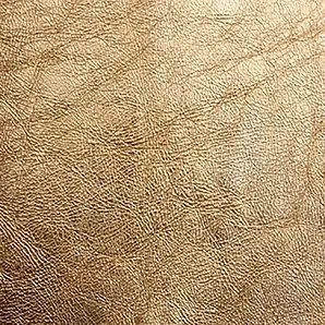 Close-up Metal Leather: textured and elegant metallic gold. Intense sheen enhances depth.