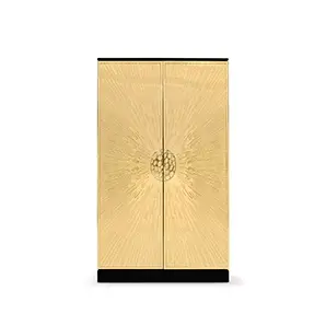 Heive Armoire with radiant gold finish and sunburst-inspired artistic design.