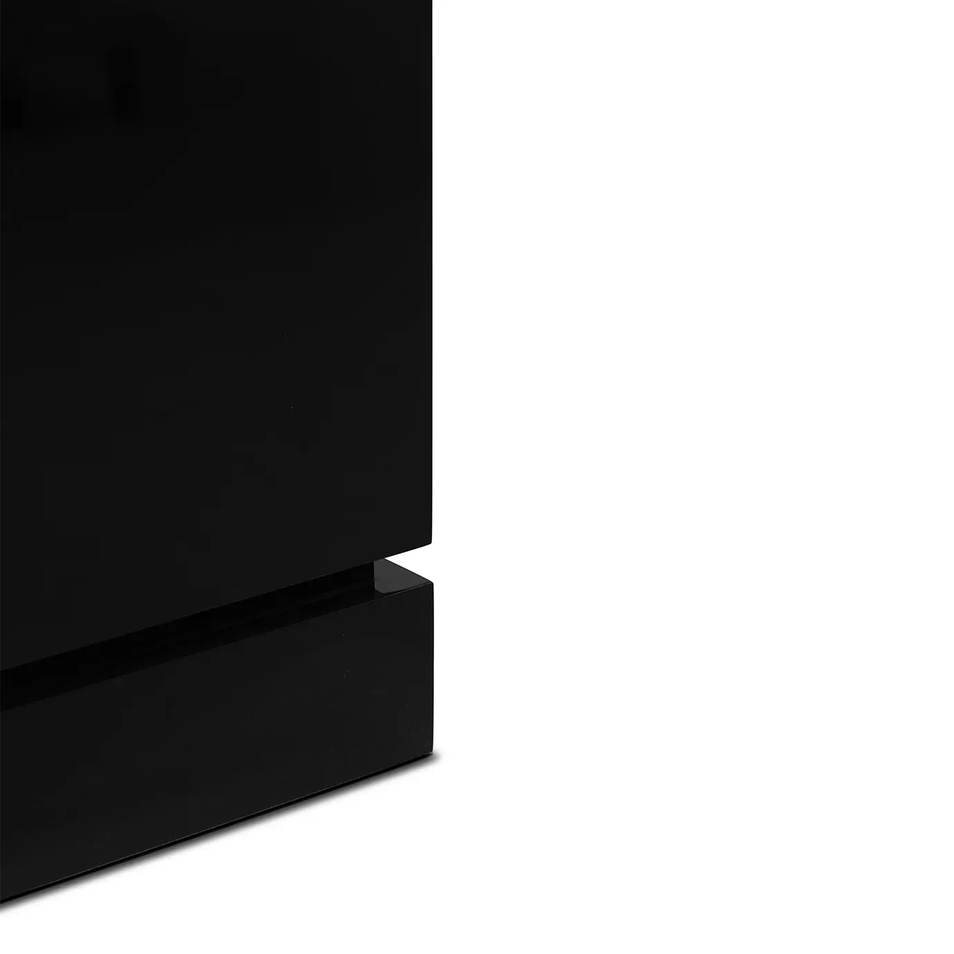 Sleek black base of the Heive armoire.