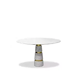 Elegant Avalanche Carrara Marble Dining Table with golden geometric base.