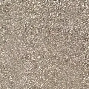 A close-up shows the subtly pebbled texture of Lux Synthetic Leather in a soft, shimmering neutral tone.