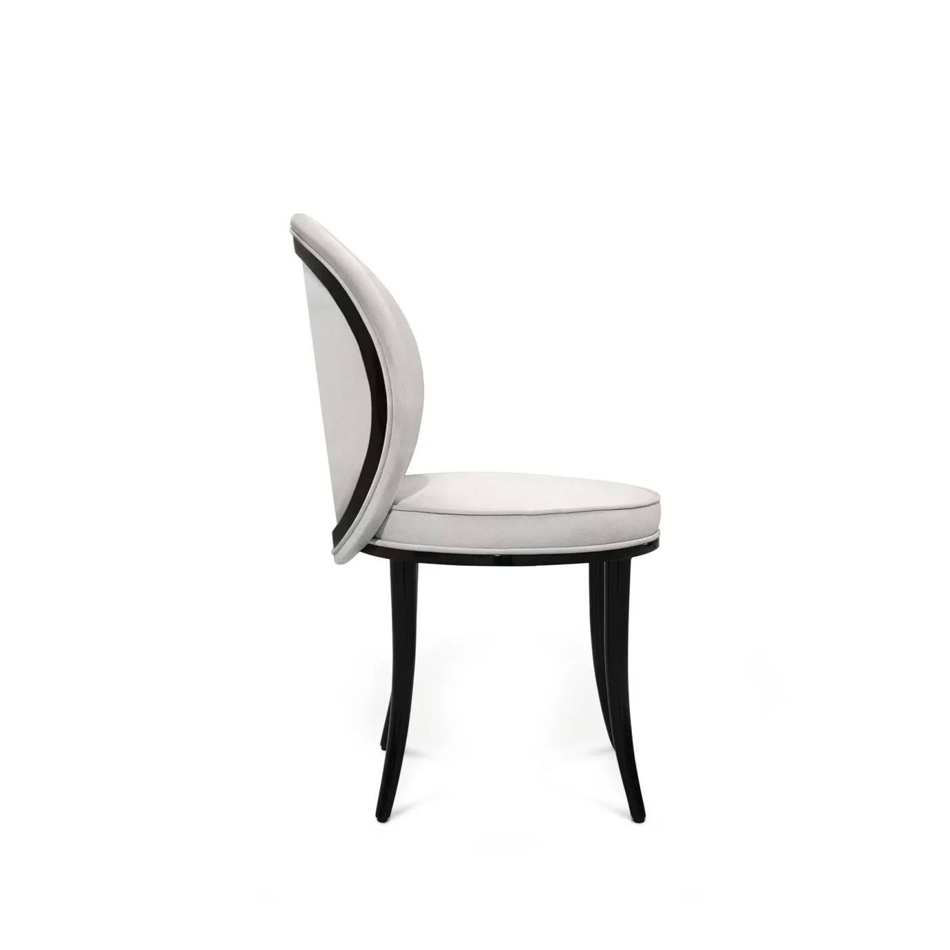Merveille Fabric Back Dining Chair: Sleek white upholstered chair with a black frame and curved legs, showcasing a modern and elegant design.