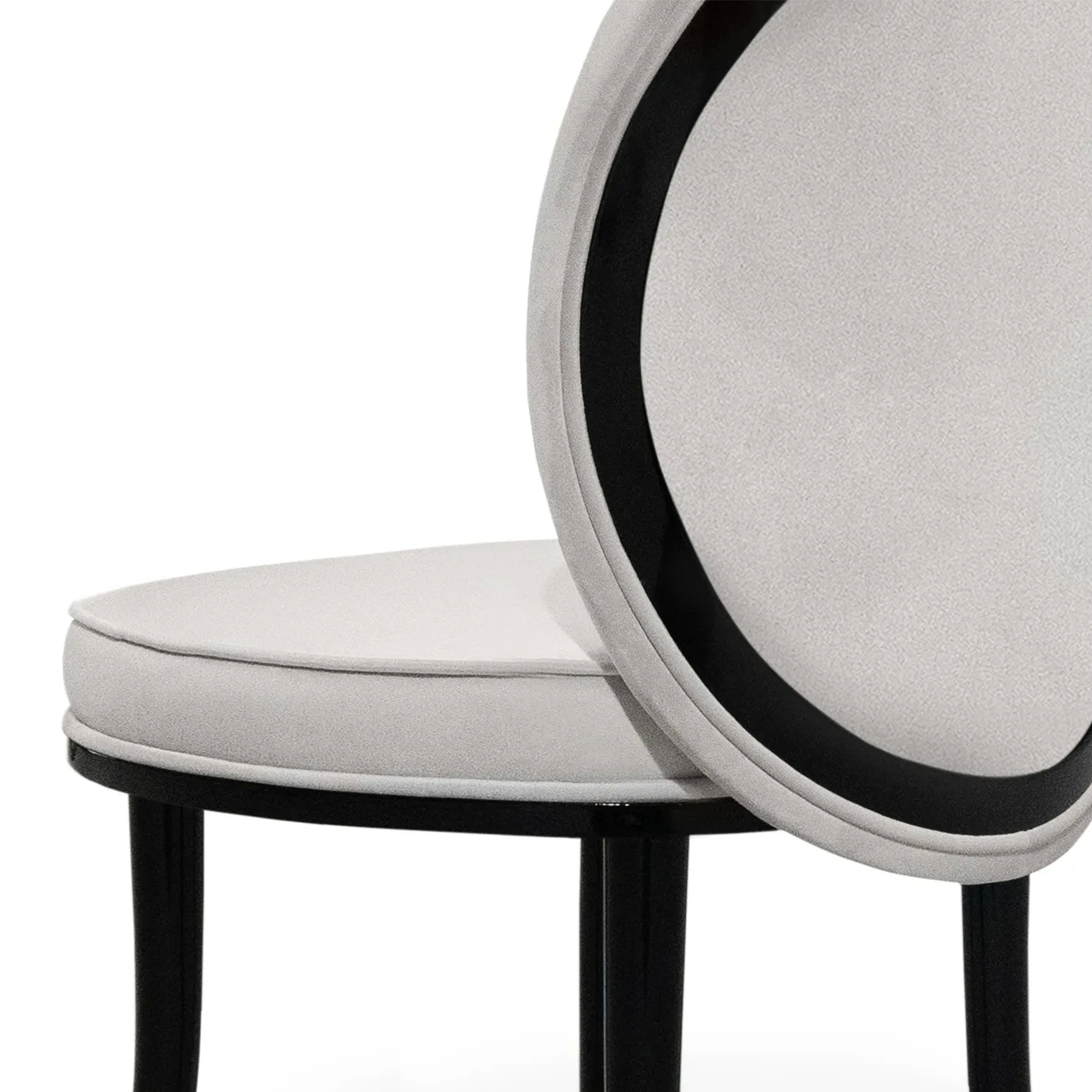 Merveille Fabric Back Dining Chair: Close-up of the back, highlighting the white upholstery and black frame with a sleek, modern design.