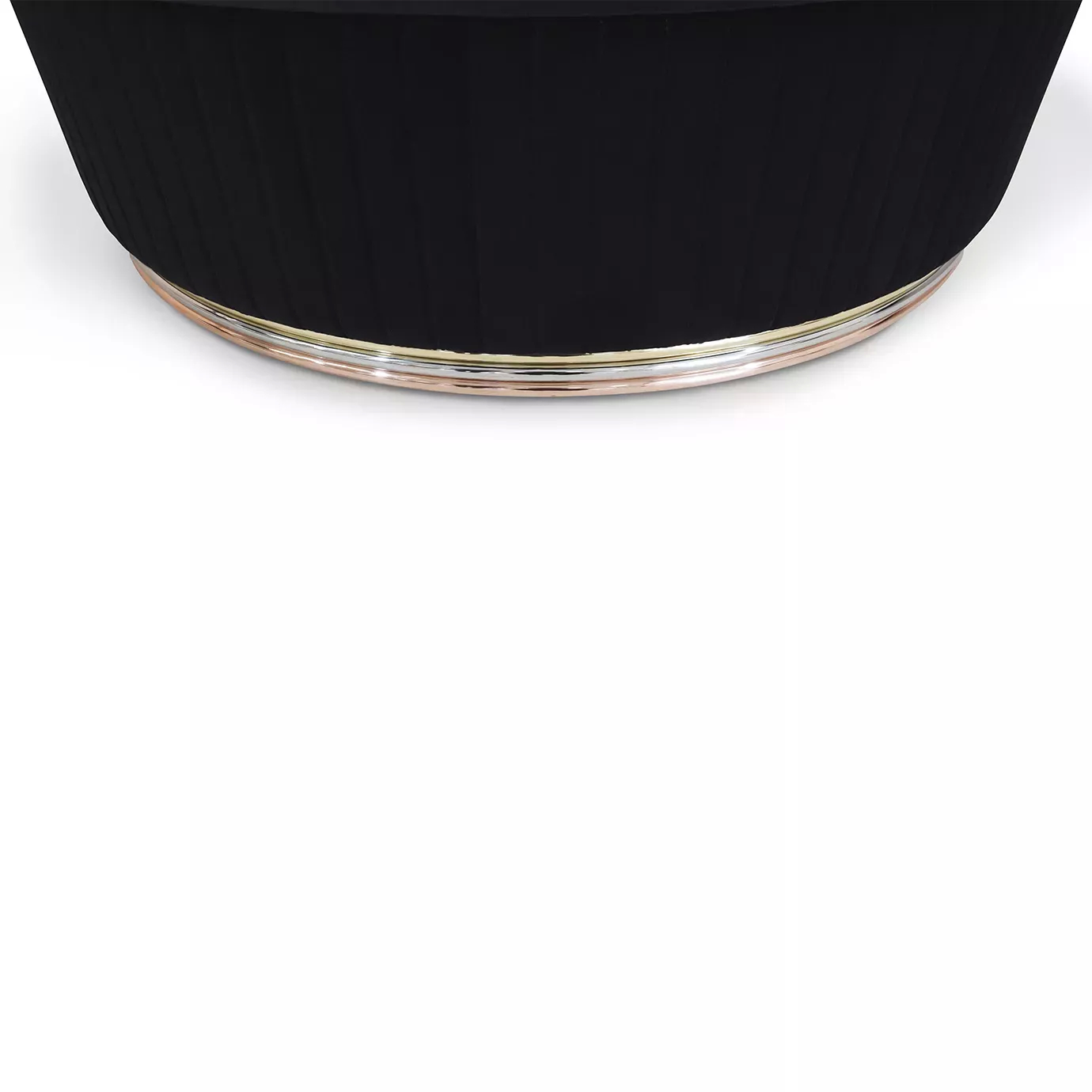 Mia Ottoman: Close-up of the base, showcasing the rose gold trim and black pleated fabric detail.