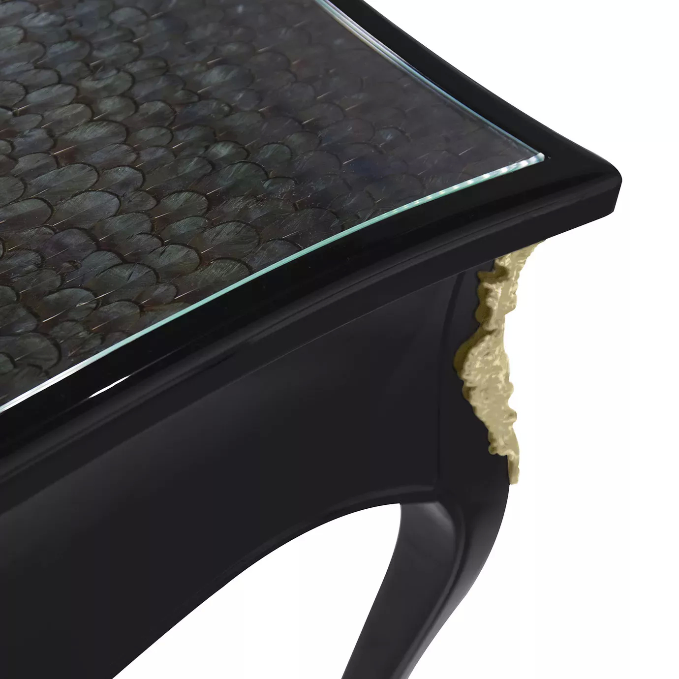 Elegant close-up of the peacock feather pattern top under glass of the Exotic Ormolu Desk.