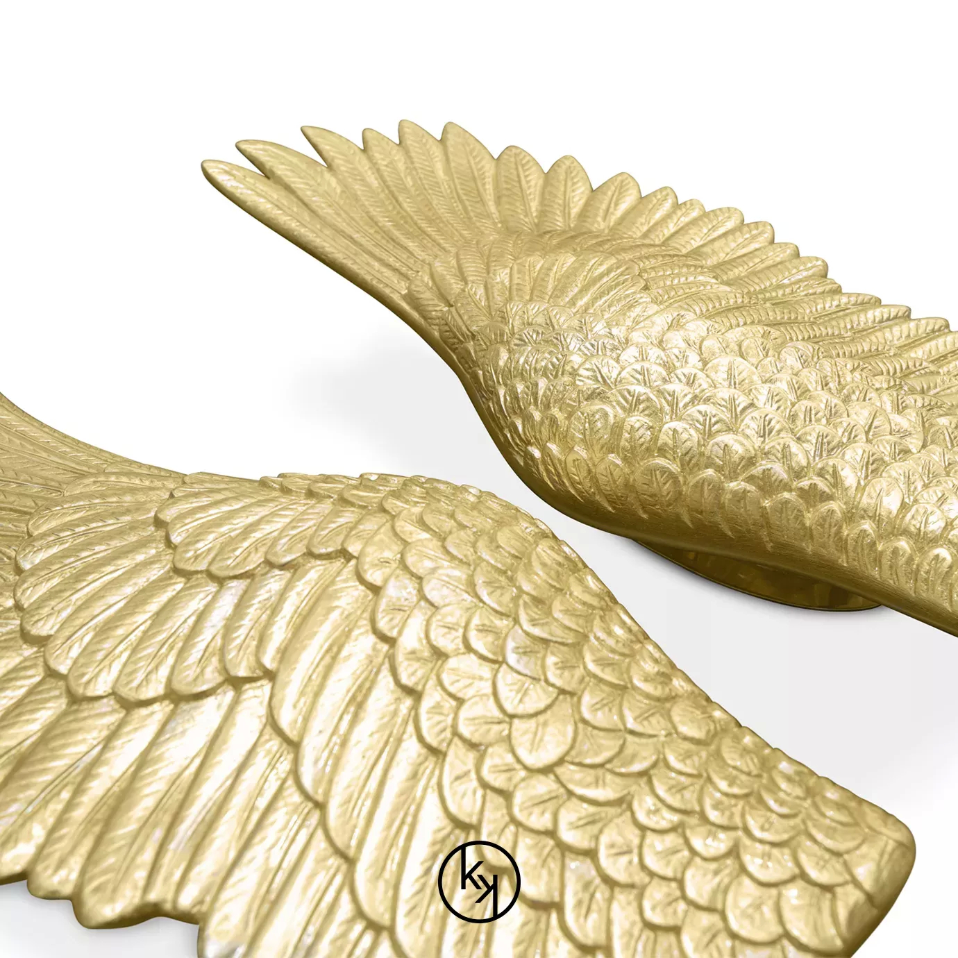 Pluma Sconce by KOKET featuring sculptural golden wings with detailed featherwork, symmetrically arranged in a radiant, angelic design