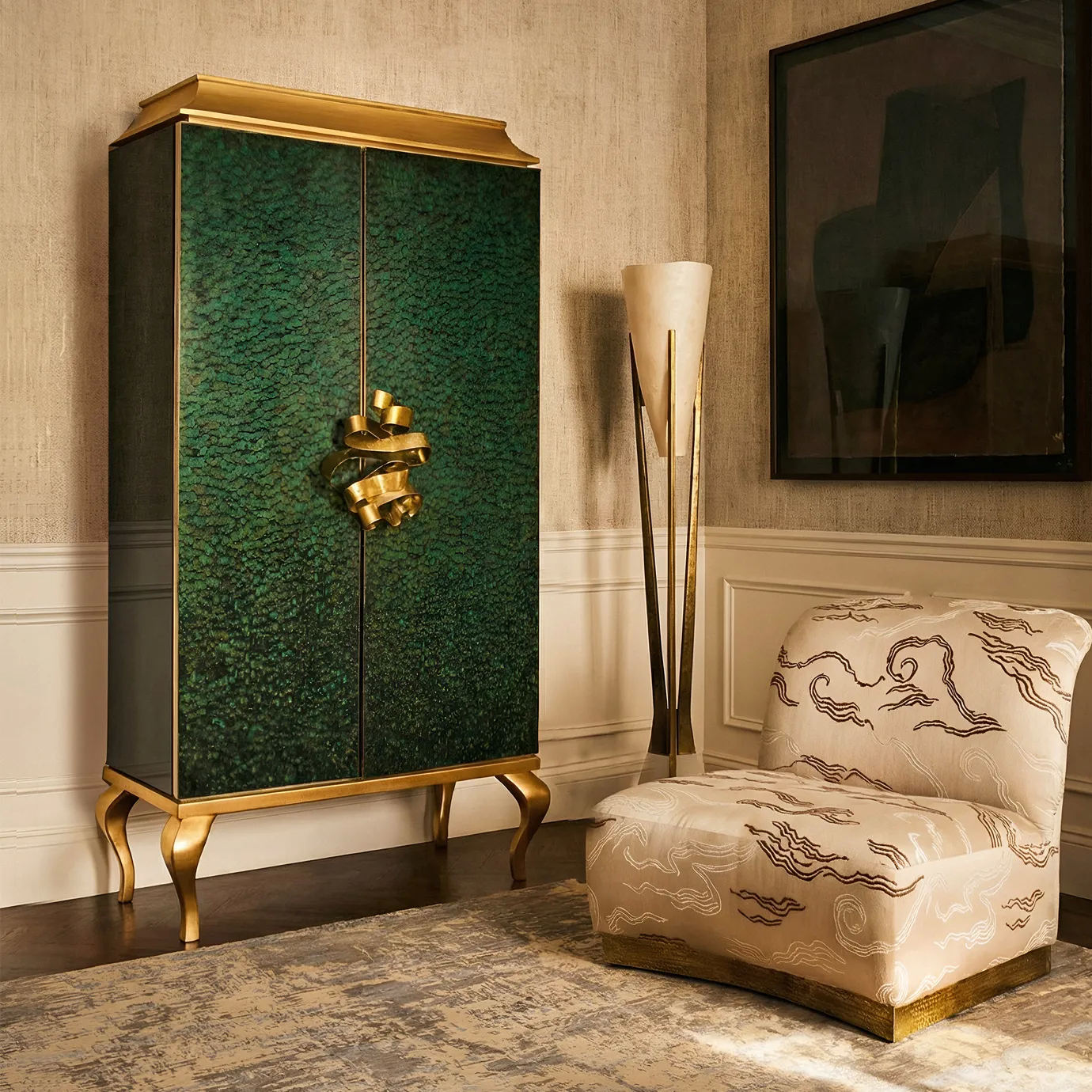 Elegant interior scene with the KOKET Divine Peacock Feather Armoire open to reveal illuminated shelving, styled with a Cleopatra lounge chair and a woman interacting with the luxury cabinet.
