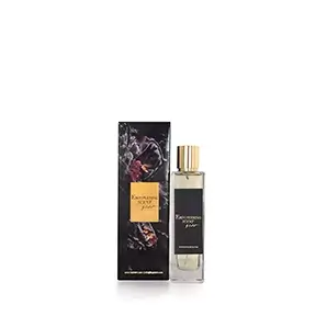 Empowering Scent perfume: rectangular glass bottle with gold cap, next to its floral-patterned packaging.