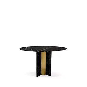 Paris Nero Marquina Marble Dining Table with a round black marble top featuring white veins and a striking black and gold cylindrical base.